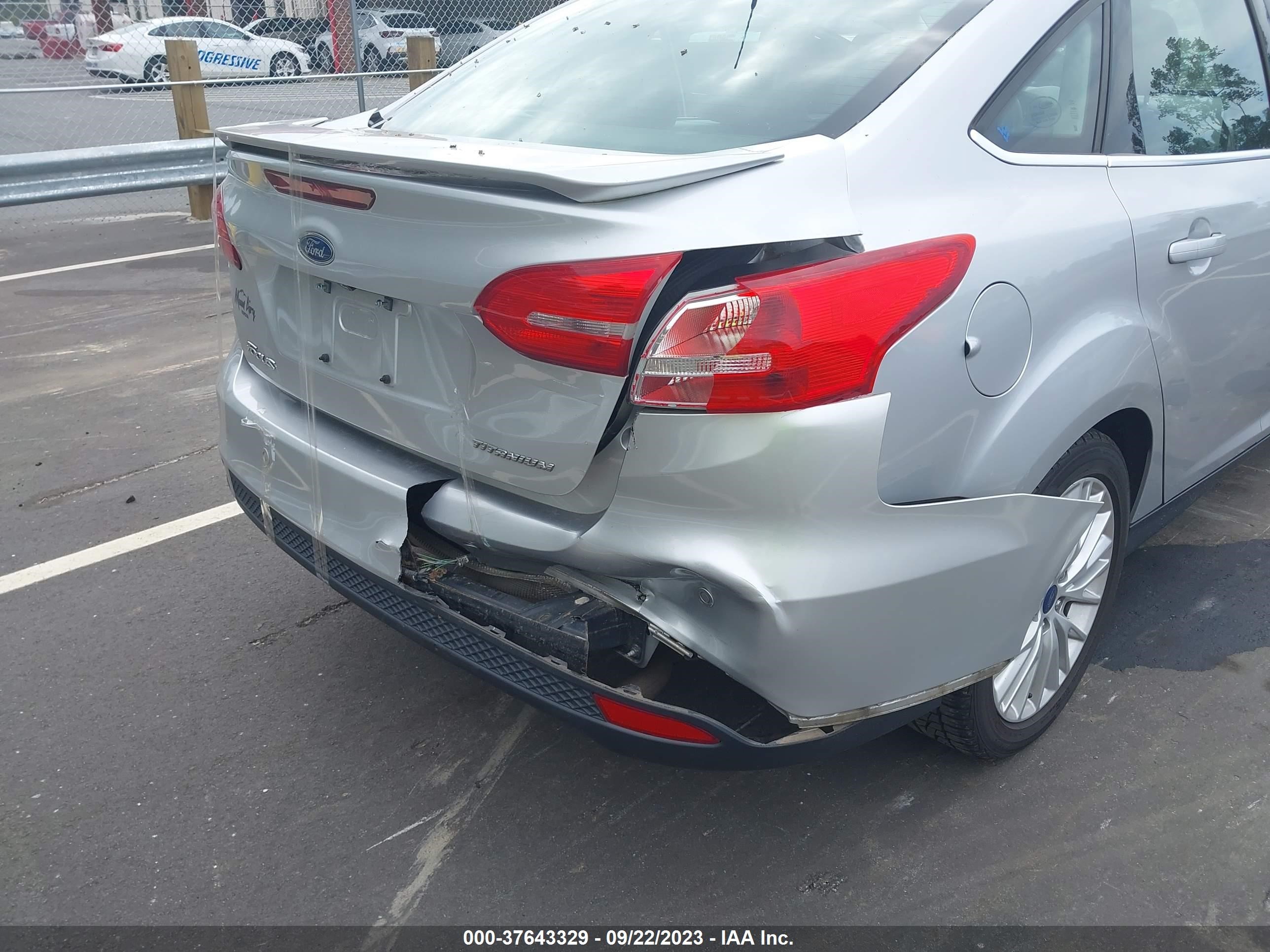 Photo 11 VIN: 1FADP3J22JL238372 - FORD FOCUS 