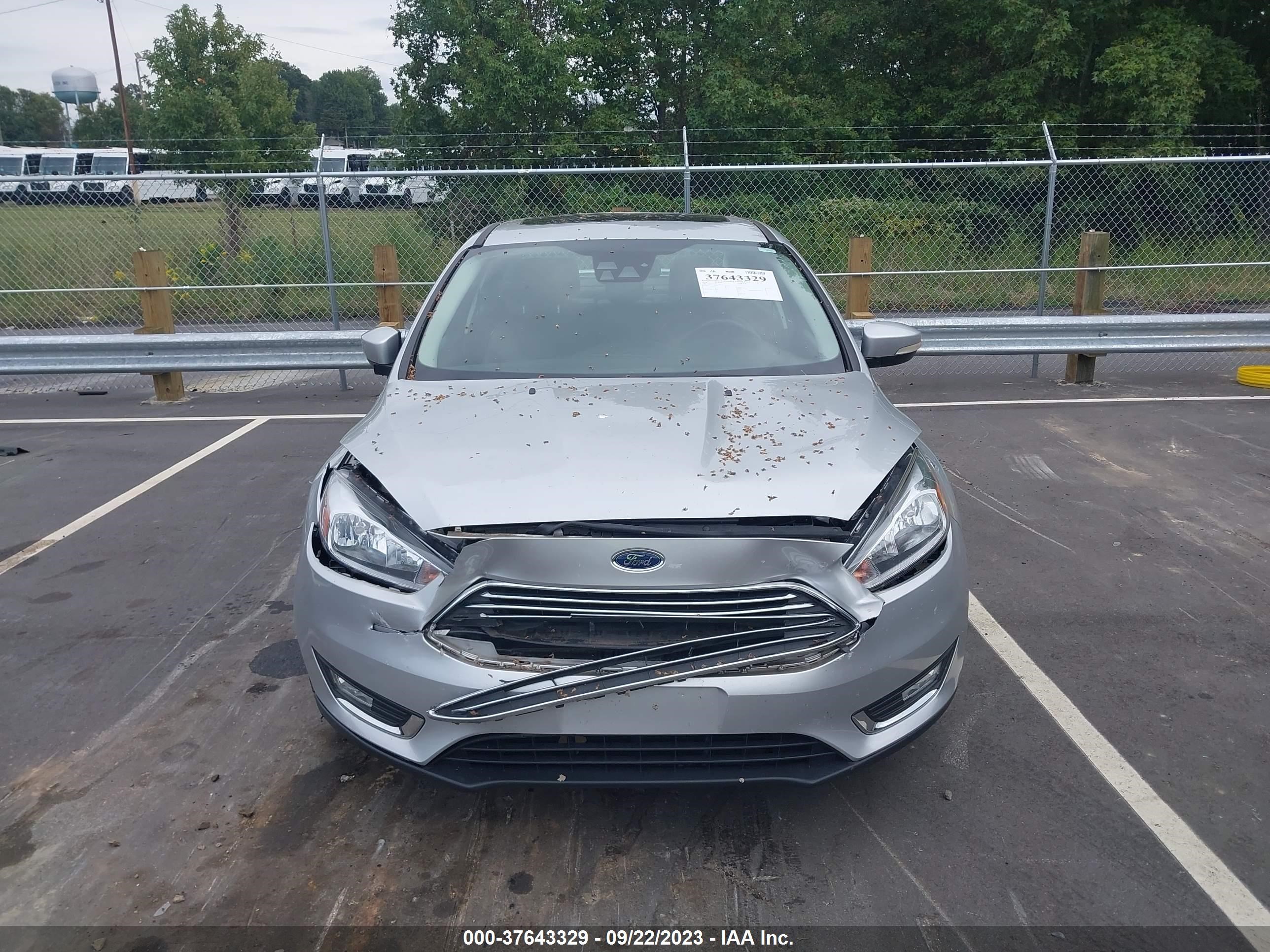 Photo 12 VIN: 1FADP3J22JL238372 - FORD FOCUS 