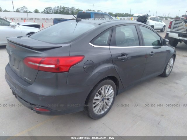 Photo 3 VIN: 1FADP3J22JL240283 - FORD FOCUS 