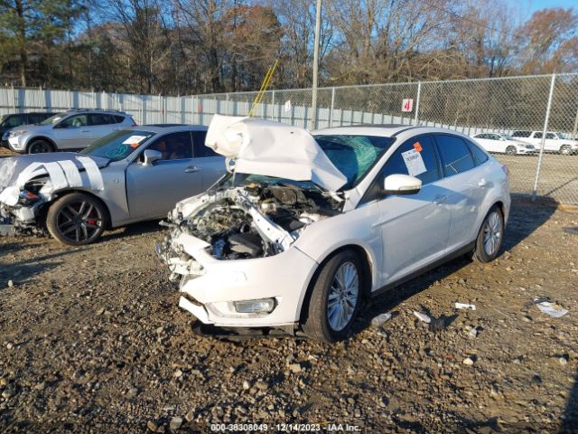 Photo 1 VIN: 1FADP3J22JL314057 - FORD FOCUS 