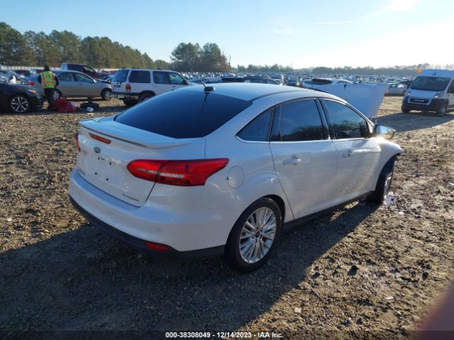 Photo 3 VIN: 1FADP3J22JL314057 - FORD FOCUS 