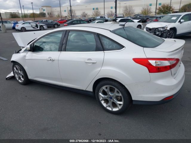 Photo 2 VIN: 1FADP3J23EL342410 - FORD FOCUS 