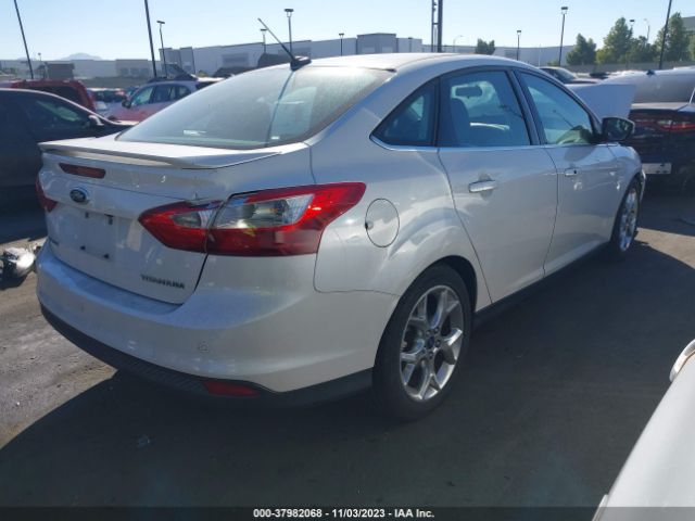 Photo 3 VIN: 1FADP3J23EL342410 - FORD FOCUS 