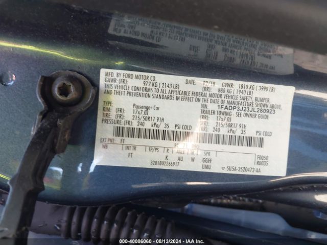 Photo 8 VIN: 1FADP3J23JL280923 - FORD FOCUS 