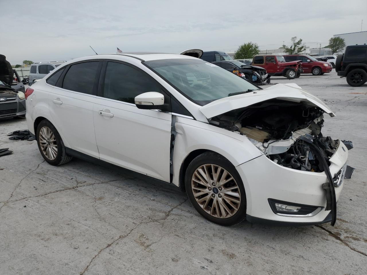 Photo 3 VIN: 1FADP3J23JL314973 - FORD FOCUS 