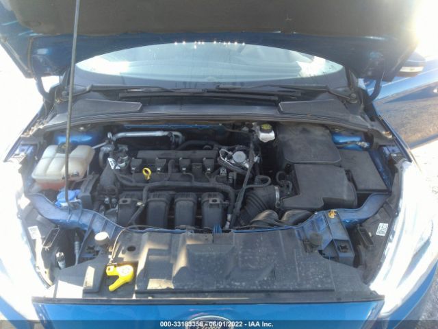 Photo 9 VIN: 1FADP3J24JL220780 - FORD FOCUS 