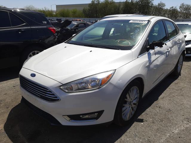 Photo 1 VIN: 1FADP3J24JL314299 - FORD FOCUS TITA 