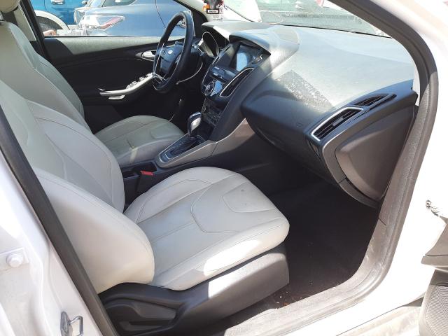 Photo 4 VIN: 1FADP3J24JL314299 - FORD FOCUS TITA 