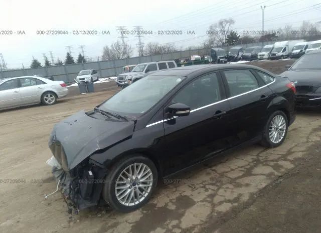 Photo 1 VIN: 1FADP3J25EL310199 - FORD FOCUS 