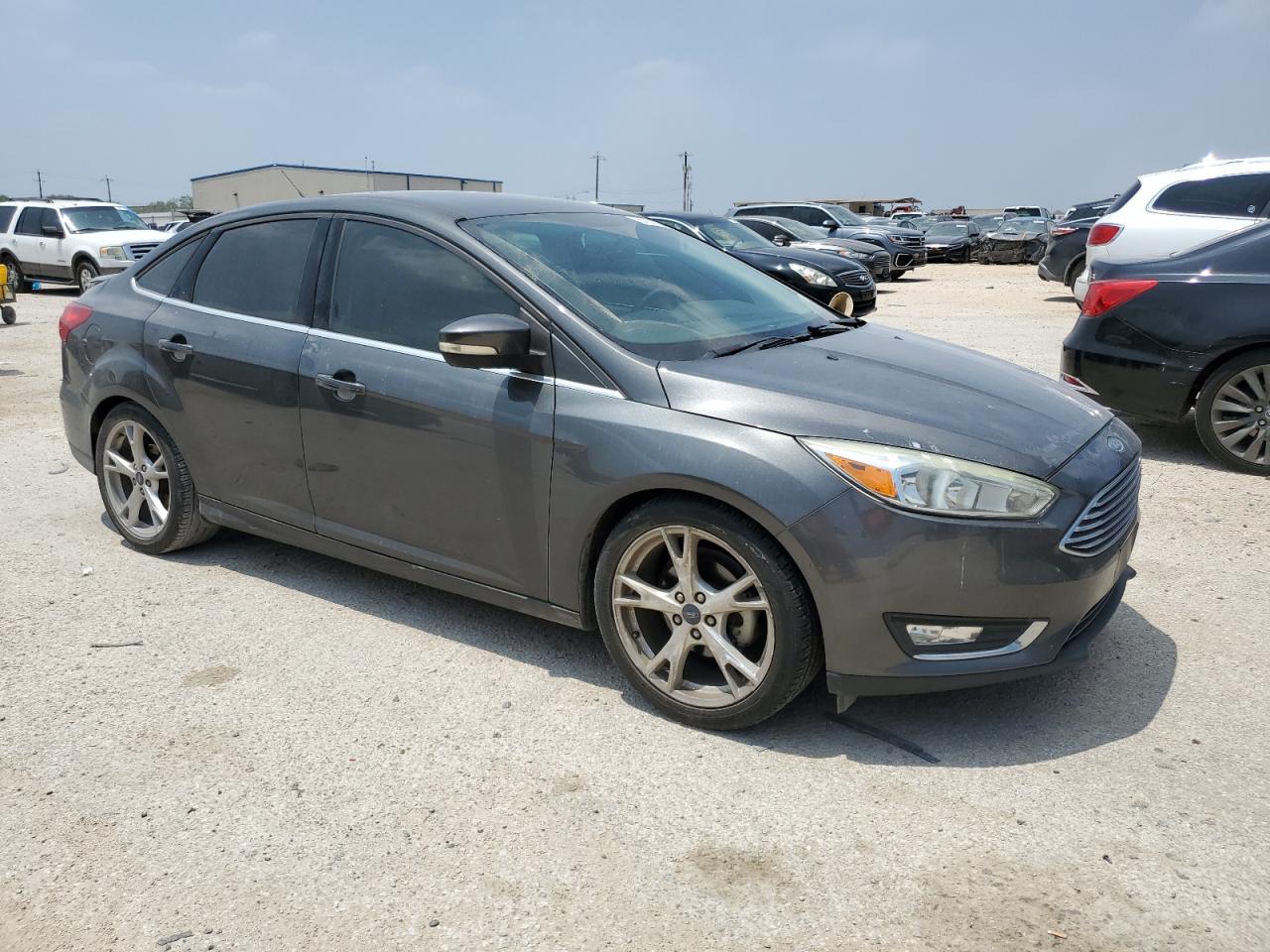 Photo 3 VIN: 1FADP3J25GL404599 - FORD FOCUS 