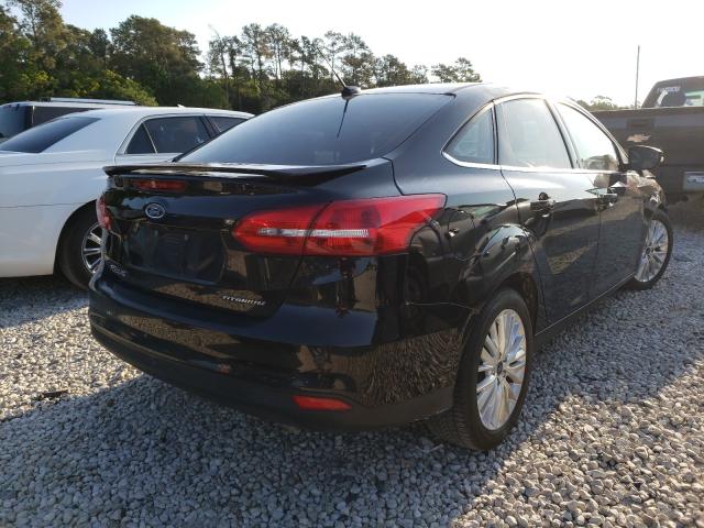 Photo 3 VIN: 1FADP3J25JL240214 - FORD FOCUS 