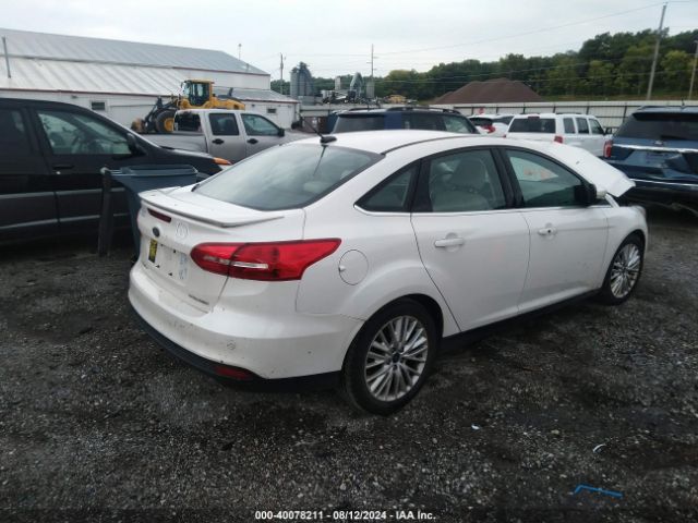 Photo 3 VIN: 1FADP3J25JL288277 - FORD FOCUS 