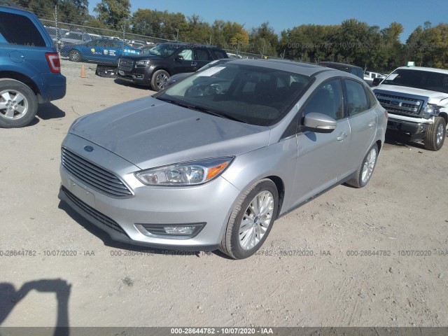 Photo 1 VIN: 1FADP3J25JL300895 - FORD FOCUS 