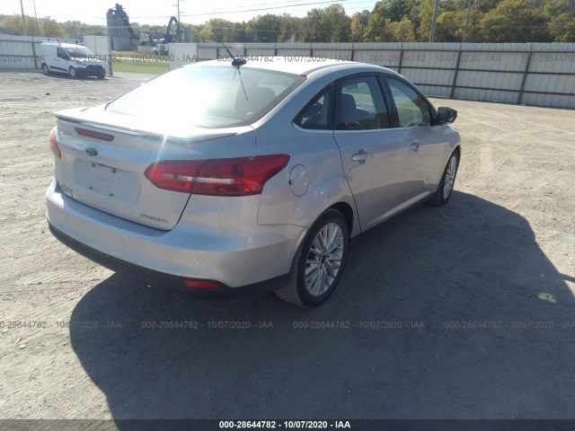 Photo 3 VIN: 1FADP3J25JL300895 - FORD FOCUS 