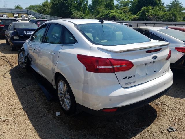 Photo 2 VIN: 1FADP3J25JL317101 - FORD FOCUS 