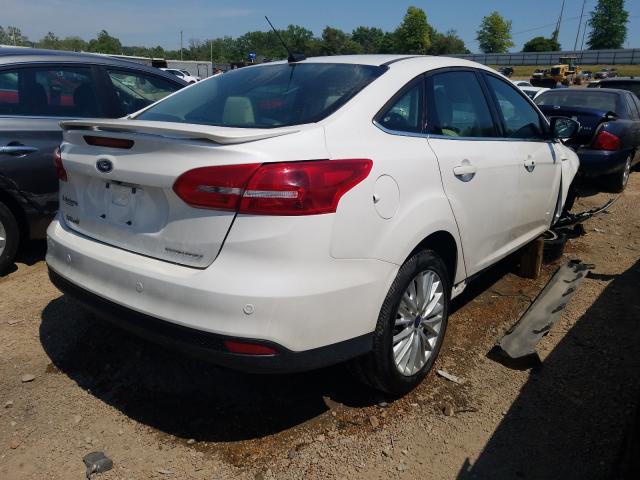 Photo 3 VIN: 1FADP3J25JL317101 - FORD FOCUS 