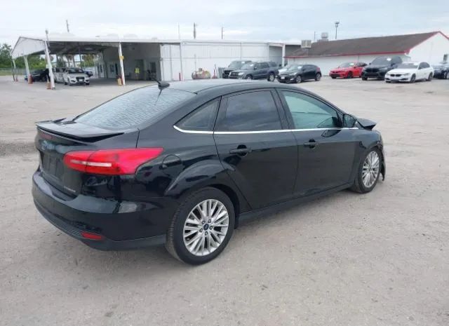 Photo 3 VIN: 1FADP3J26GL232146 - FORD FOCUS 