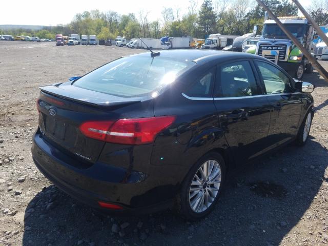 Photo 3 VIN: 1FADP3J26HL237803 - FORD FOCUS 