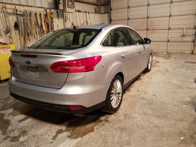 Photo 3 VIN: 1FADP3J26JL294461 - FORD FOCUS 