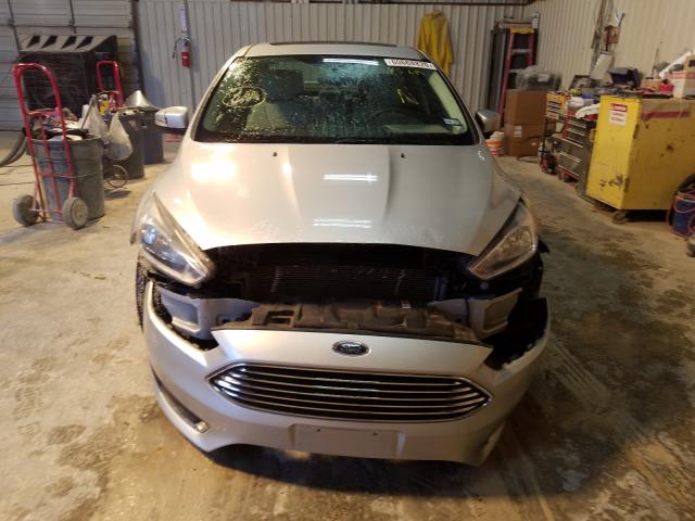 Photo 8 VIN: 1FADP3J26JL294461 - FORD FOCUS 