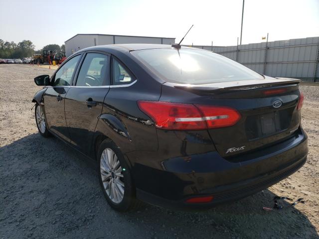 Photo 2 VIN: 1FADP3J27GL210351 - FORD FOCUS 