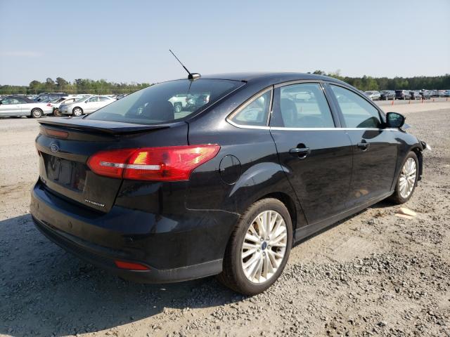 Photo 3 VIN: 1FADP3J27GL210351 - FORD FOCUS 