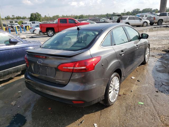 Photo 3 VIN: 1FADP3J27JL317097 - FORD FOCUS 