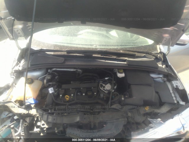 Photo 9 VIN: 1FADP3J27JL323661 - FORD FOCUS 