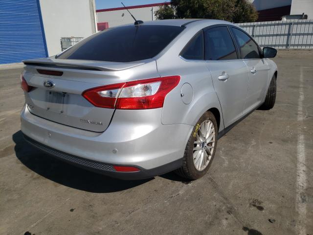 Photo 3 VIN: 1FADP3J28EL144647 - FORD FOCUS TITA 