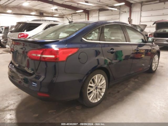 Photo 3 VIN: 1FADP3J28GL297337 - FORD FOCUS 