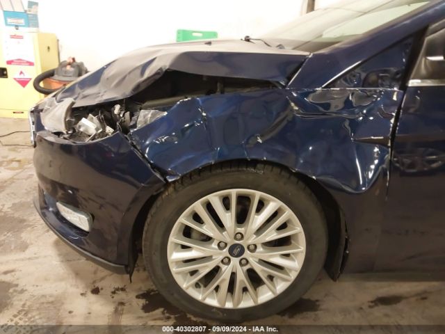 Photo 5 VIN: 1FADP3J28GL297337 - FORD FOCUS 