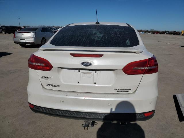 Photo 5 VIN: 1FADP3J28GL336671 - FORD FOCUS 