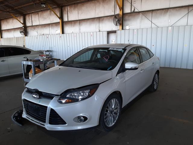 Photo 1 VIN: 1FADP3J2XDL122342 - FORD FOCUS TITA 