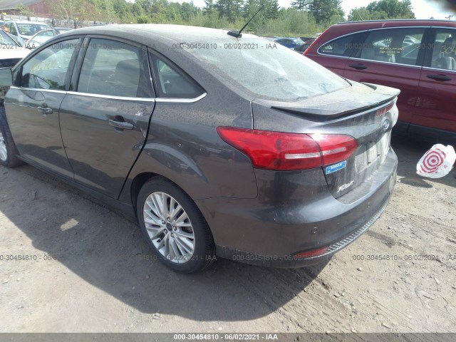 Photo 2 VIN: 1FADP3J2XGL223577 - FORD FOCUS 