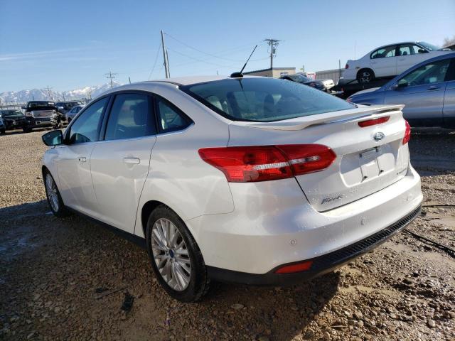 Photo 1 VIN: 1FADP3J2XGL334839 - FORD FOCUS 