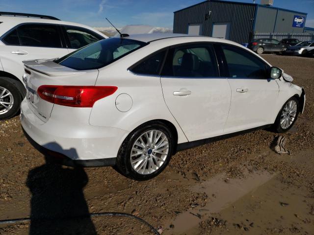 Photo 2 VIN: 1FADP3J2XGL334839 - FORD FOCUS 