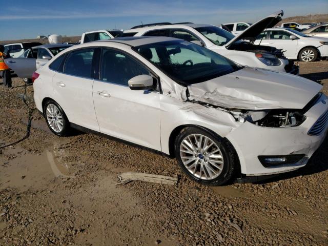 Photo 3 VIN: 1FADP3J2XGL334839 - FORD FOCUS 