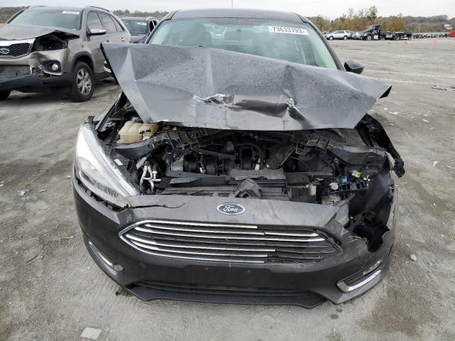 Photo 4 VIN: 1FADP3J2XGL395298 - FORD FOCUS 