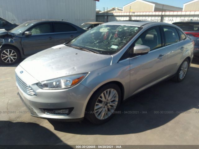 Photo 1 VIN: 1FADP3J2XJL229712 - FORD FOCUS 