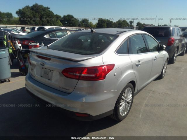 Photo 3 VIN: 1FADP3J2XJL229712 - FORD FOCUS 