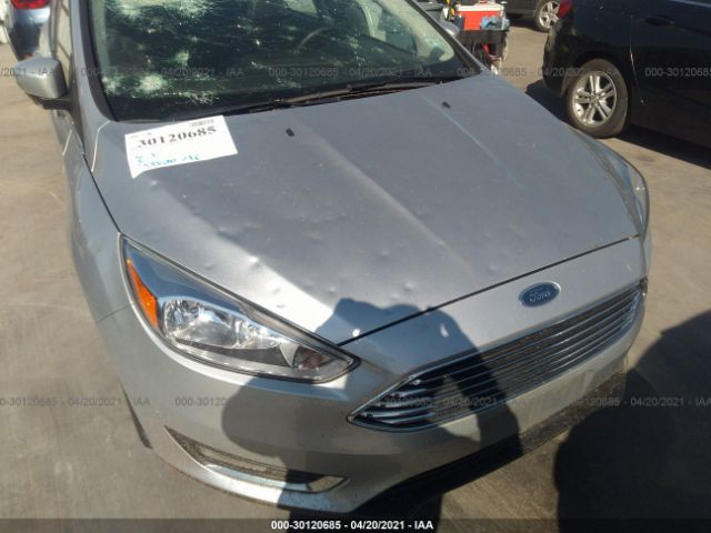 Photo 5 VIN: 1FADP3J2XJL229712 - FORD FOCUS 