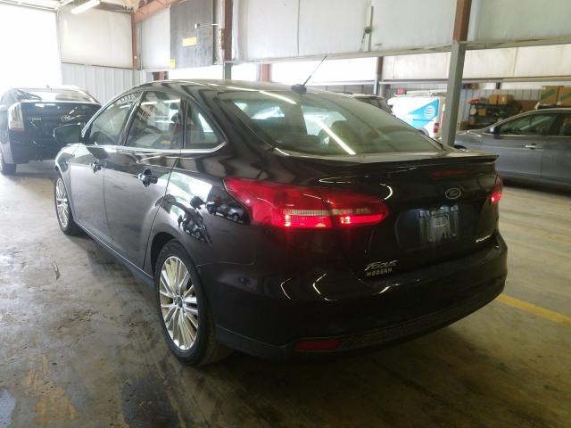 Photo 2 VIN: 1FADP3J2XJL331673 - FORD FOCUS 