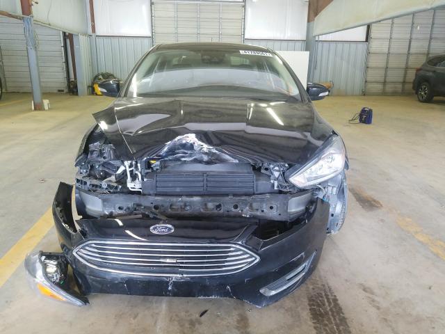 Photo 8 VIN: 1FADP3J2XJL331673 - FORD FOCUS 