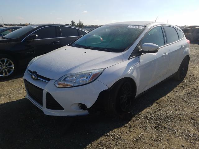 Photo 1 VIN: 1FADP3K20EL326471 - FORD FOCUS SE 