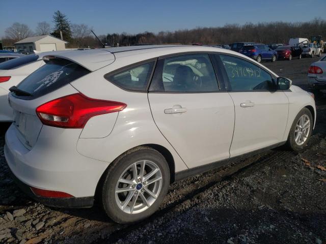 Photo 3 VIN: 1FADP3K20GL230892 - FORD FOCUS SE 