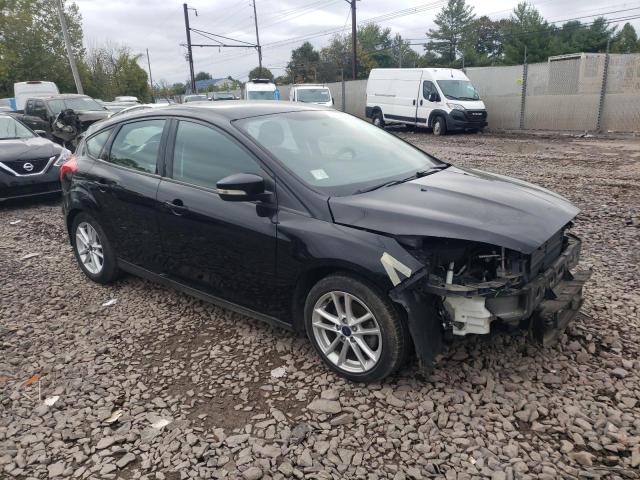 Photo 3 VIN: 1FADP3K20GL242377 - FORD FOCUS SE 