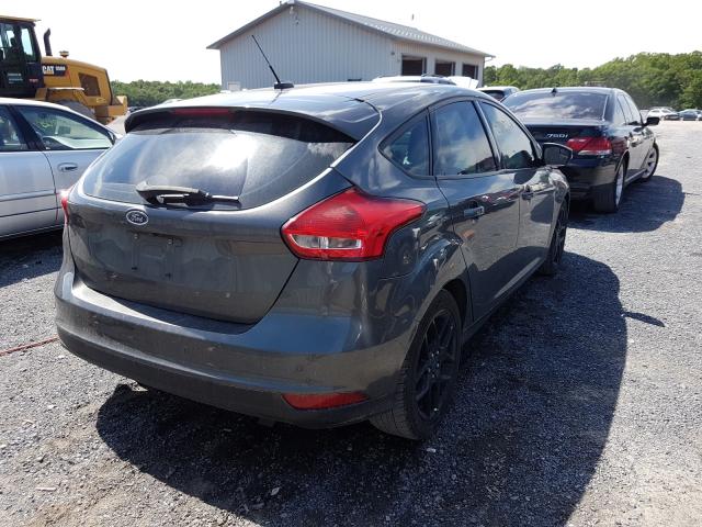 Photo 3 VIN: 1FADP3K20GL248387 - FORD FOCUS SE 