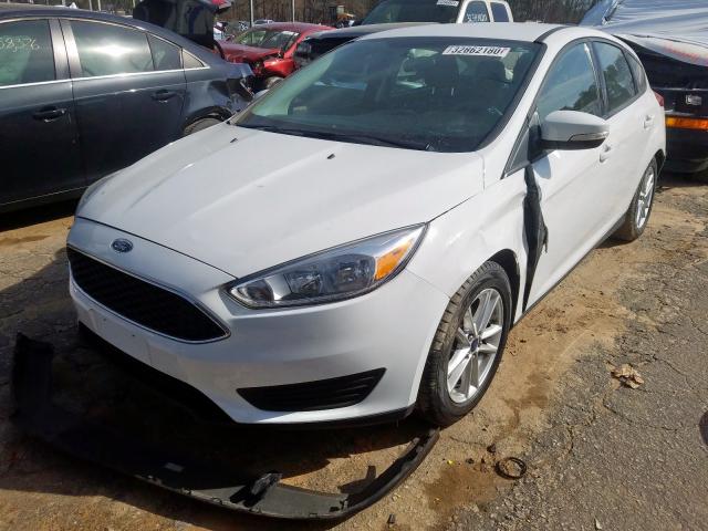 Photo 1 VIN: 1FADP3K20GL256490 - FORD FOCUS SE 