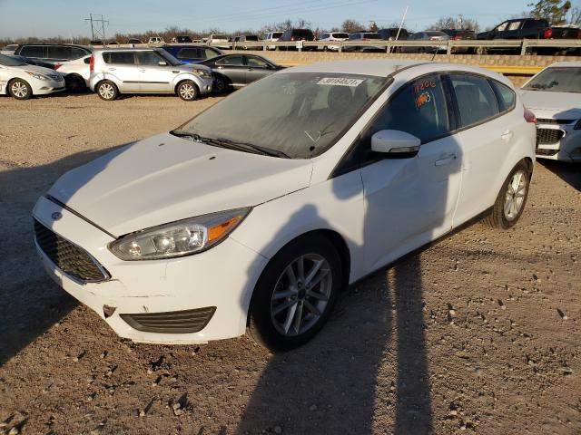 Photo 1 VIN: 1FADP3K20GL270809 - FORD FOCUS SE 