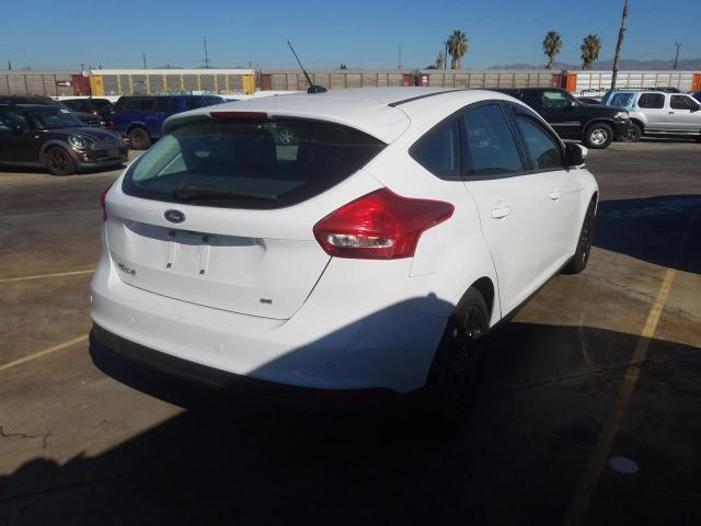 Photo 3 VIN: 1FADP3K20GL332533 - FORD FOCUS SE 